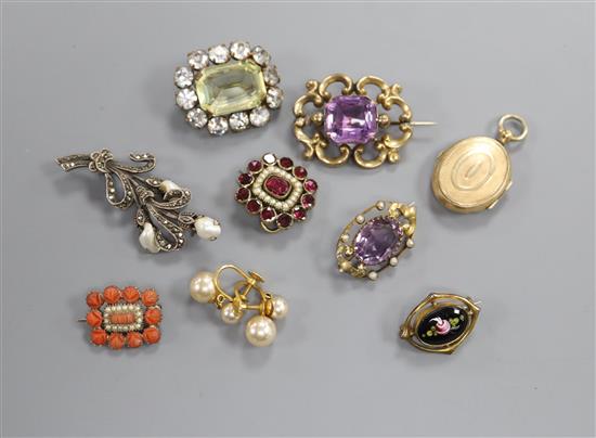 Two early 20th century amethyst brooches, five other brooches, pair of earrings and an engraved locket.